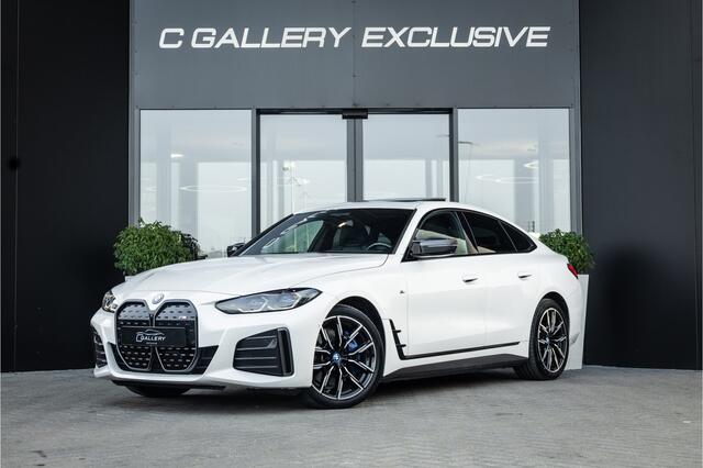 BMW i4 M50 High Executive 84 kWh - M Sport | Panorama | Carbon | 360 Camera | Sportstoelen