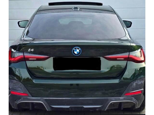 BMW i4 eDrive35 High Executive 70 kWh M Sport | Harman Kardon | Panoramadak | Stuurverwarming | Stoelverwarming | Head-Up Display | Adaptive Cruise Control | Keyless | Memory Seats | Laser Lights | Trekhaak | 360 Camera