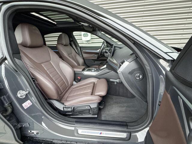 BMW i4 eDrive40 M Sportpakket Pro / High Executive / Achteruitrijcamera / Elektrisch bediend glazen schuif-/kanteldak / Elektrisch verwarmde voorstoelen