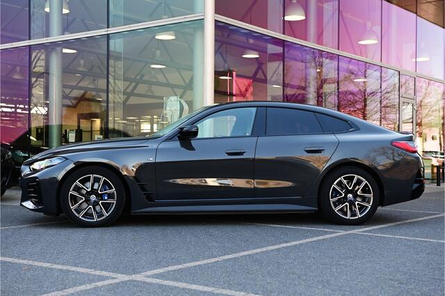 BMW i4 M50 High Executive / Schuif-kanteldak / M Sportstoelen / M Adaptief onderstel / Driving Assistant Professional / Parking Assistant Professional / HiFi / Head-Up / Comfort Access