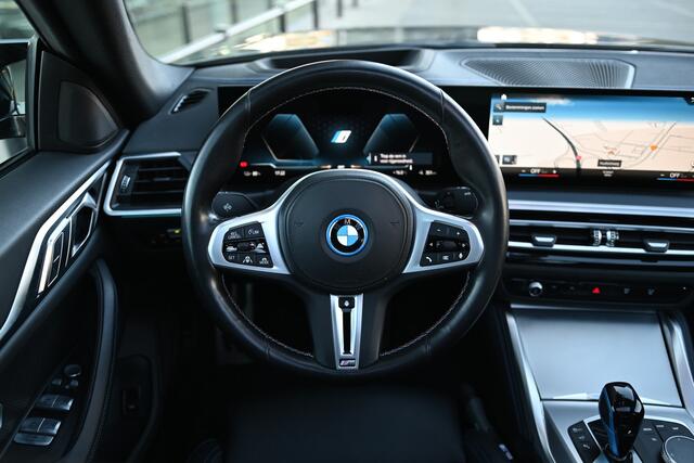 BMW i4 M50 High Executive / Schuif-kanteldak / M Sportstoelen / M Adaptief onderstel / Driving Assistant Professional / Parking Assistant Professional / HiFi / Head-Up / Comfort Access