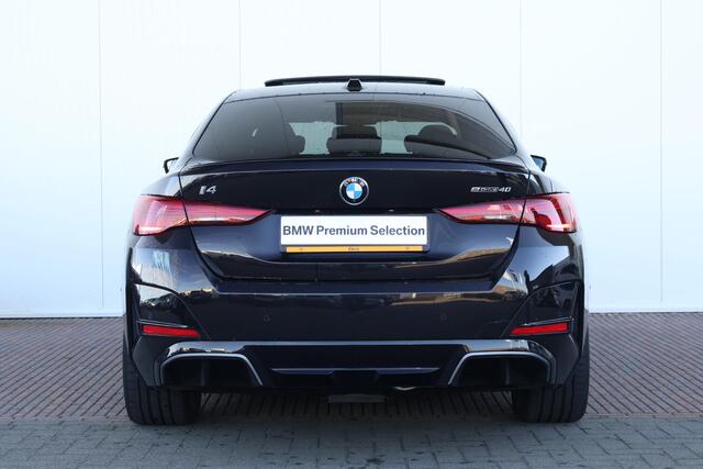 BMW i4 eDrive40 M Sport Edition 84 kWh M Sportpakket Pro/ Rubin-Metallic Individual Special Request Lakkleur/ Harman-Kardon/ Trekhaak/ Driving Assistant Professional