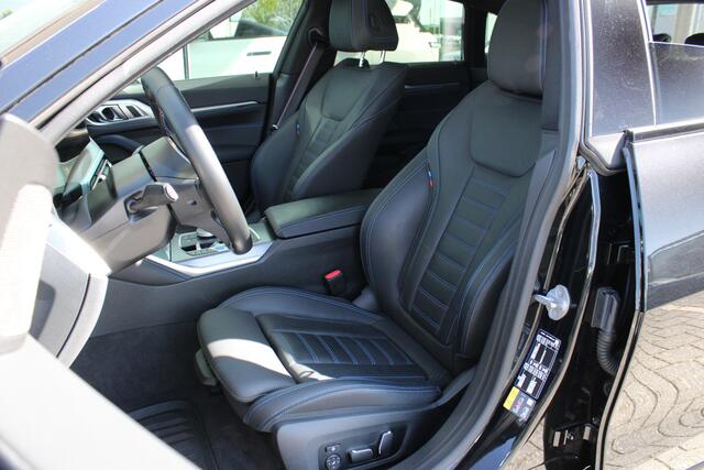 BMW i4 M50 / Schuif-kanteldak / Trekhaak / Laserlight / M Adaptief onderstel / Parking Assistant Plus / Comfort Access