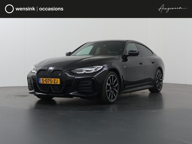 BMW i4 eDrive35 High Executive 70 kWh | M-Pakket | SOH 96% | HUD | Sportstoelen elektrisch verstelbaar + Geheugen | Camera | DAB | Apple CarPlay/Android Auto | Adaptieve Cruise Control | Ele. kofferdeksel |
