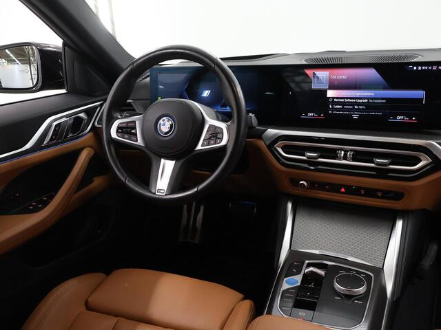 BMW i4 eDrive35 High Executive 70 kWh | M-Pakket | SOH 96% | HUD | Sportstoelen elektrisch verstelbaar + Geheugen | Camera | DAB | Apple CarPlay/Android Auto | Adaptieve Cruise Control | Ele. kofferdeksel |