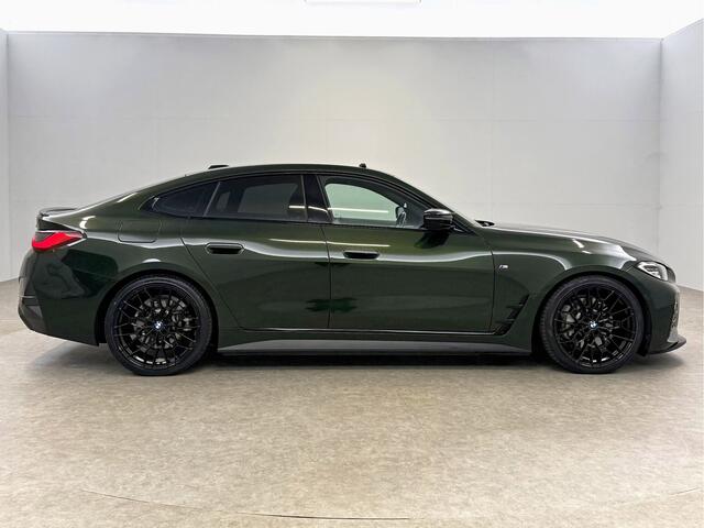BMW i4 eDrive40 84 kWh M-Sport | M-Performance kit | Pano | 20''LMV | Widescreen | BMW-LED | Snelladen | SOH 92% | Camera | Sfeer | Virtual | Trekhaak | Carplay
