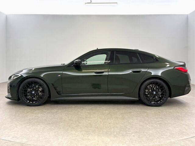 BMW i4 eDrive40 84 kWh M-Sport | M-Performance kit | Pano | 20''LMV | Widescreen | BMW-LED | Snelladen | SOH 92% | Camera | Sfeer | Virtual | Trekhaak | Carplay