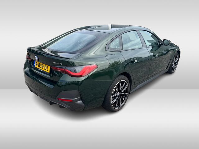 BMW i4 eDrive40 High Executive 84 kWh / SoH 99% / Trekhaak / Schuifdak / Camera / Head-up / Leder / 19'' / CarPlay / Stoelverwarming / Sfeerverlichting / Dodehoek / ACC