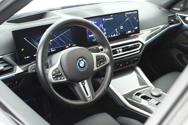 BMW i4 M50 544pk High Executive 84 kWh SOH 94% Laserlight Carbon Panoramadak Harman Kardon Keyless Leder CoPilot Trekhaak