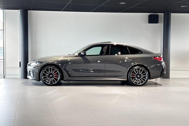 BMW i4 M60 84 kWh | M Sport Pro | Glazen schuif-/kanteldak | Harman Kardon | Stoelverwarming | Achteruitrijcamera |