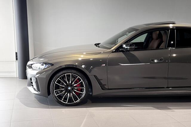 BMW i4 M60 84 kWh | M Sport Pro | Glazen schuif-/kanteldak | Harman Kardon | Stoelverwarming | Achteruitrijcamera |