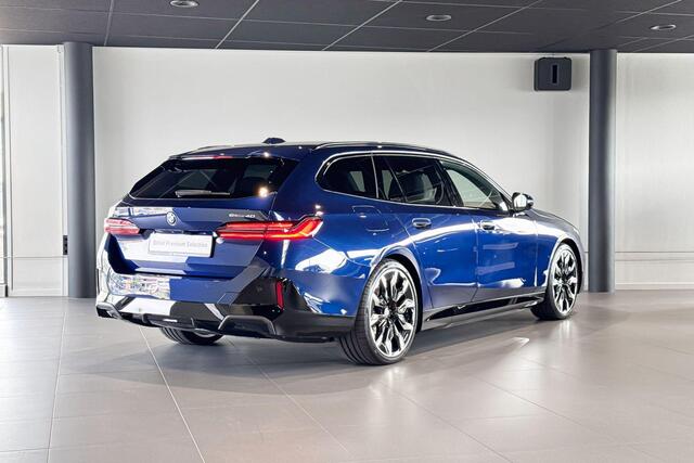 BMW i5 Touring eDrive40 M Sport Edition | M Sport Pro | Glazen Panoramadak | Harman Kardon | Stoelventilatie | Trekhaak |