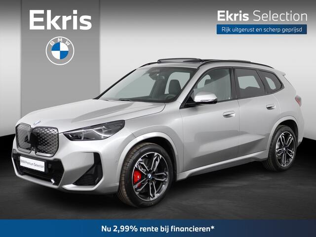BMW iX1 eDrive20 67 kWh M Sport Edition M Sportpakket Pro | Driving Assistant Plus | Harman-Kardon | Trekhaak | Panoramadak | Parking Assistant Plus | Head-Up Display | M Adaptief onderstel