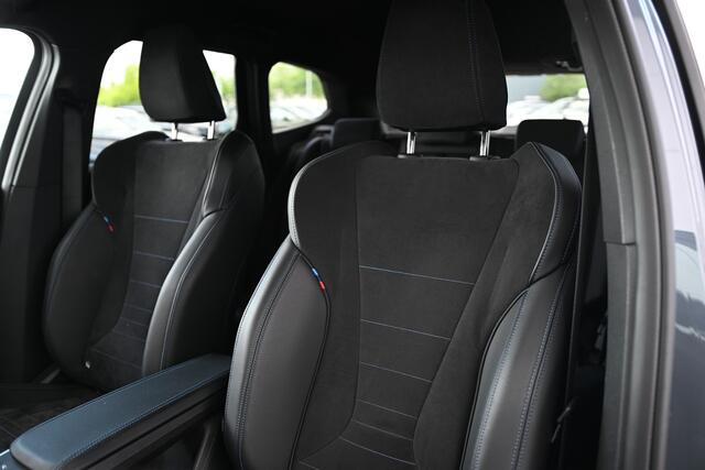BMW iX1 eDrive20 M Sport / Sportstoelen / Achteruitrijcamera / Stoelverwarming / Getint glas / PDC / 20" LMV