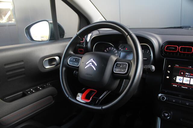 Citroen C3 Aircross 1.2 PureTech S&S Shine | Incl. 12 maanden garantie | Keyless | Camera | Navi | Apple Carplay | Trekhaak | Privacy glass | DAB+ ontvangst | Climate control | Dodehoek detectie | Parkeer assistent | Automatisch grootlicht | Cruise control | Achteru