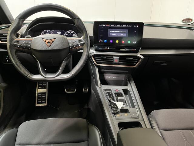 Cupra Leon 1.4 e-Hybrid Business / AUTOMAAT/ KEYLESS/ 3-ZONE CLIMA/ ADAPT. CRUISE/ LED/ DIGITAL DASH/ STOEL-STUUR VERWARM./ FULL LINK/ NAVI/ PARK. SENSOREN + CAMERA/ RIJ-MODI/ 18" LMV