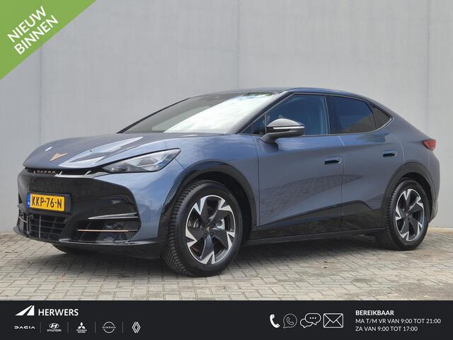 Cupra Tavascan Business 82 kWh / Fabrieksgarantie t/m 8-2027 / SOH 100% / All season banden / CCS snelladen / Elektrische achterklep / Warmtepomp / Stuur- Stoel & Voorruit verwarming / Achteruitrijcamera / Adaptief cruise control / Keyless Entry/Start / Apple Carplay An