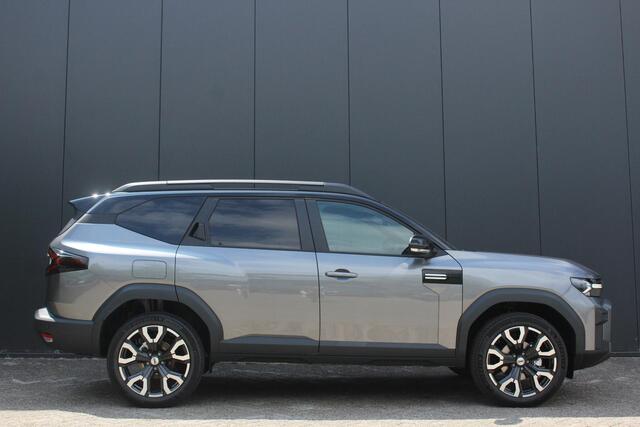 Dacia Bigster 1.8 Hybrid 155Pk Extreme | Navigatie | Virtual Cockpit | Draadloze Apple & Android Carplay | Parkeersensoren Voor & Achter | Middenarmsteun | Camera | 19 Inch Lichtmetalen Velgen | Elektrische Achterklep |