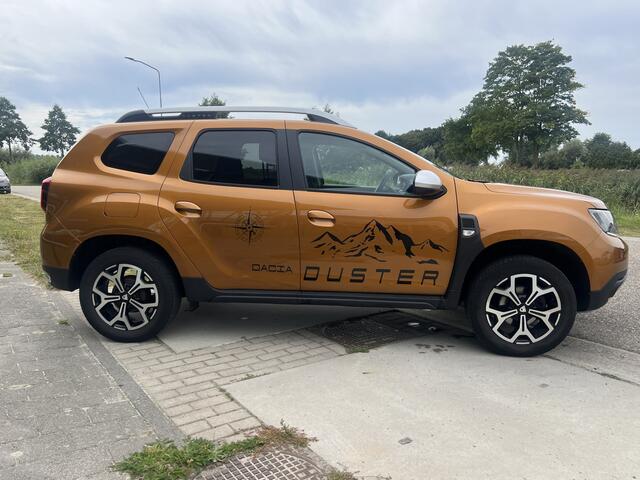 Dacia DUSTER 1.3 TCe 130pk Prestige / Dealer onderhouden / Trekhaak / 17' velgen / Camera / Climate / Applecarplay - Androidauto /