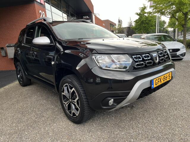 Dacia DUSTER 1.6 SCe Prestige // NAVI // CAMERA // CLIMA // CRUISE // STOELVERWARMING