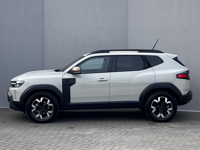 Dacia DUSTER 1.6 Hybrid 140 Extreme Automaat / Fabrieksgarantie tot 05-2028 < 100.000km** / Stuur- en stoelverwarming / Voorruitverwarming / Navigatie via Apple Carplay Android / 17" LM wielen /