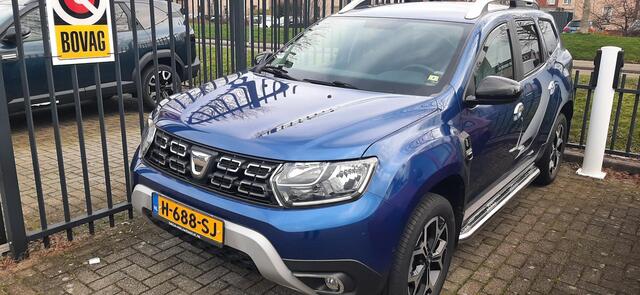 Dacia DUSTER 1.0 TCe Bi-Fuel Serie Limitee 15th Anniversary MEERDERE FOTO'S VOLGEN NOG. APPLE CARPLAY ANDROID AUTO / TREKHAAK / CLIMATE CONTROLE PARKEERSENSOREN+CAMERA / CRUISE CONTROLE.