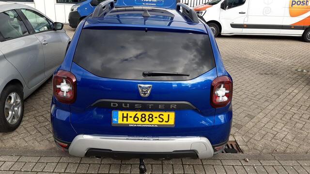 Dacia DUSTER 1.0 TCe Bi-Fuel Serie Limitee 15th Anniversary MEERDERE FOTO'S VOLGEN NOG. APPLE CARPLAY ANDROID AUTO / TREKHAAK / CLIMATE CONTROLE PARKEERSENSOREN+CAMERA / CRUISE CONTROLE.