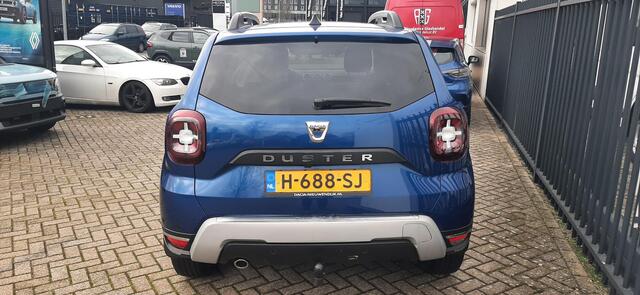 Dacia DUSTER 1.0 TCe Bi-Fuel Serie Limitee 15th Anniversary MEERDERE FOTO'S VOLGEN NOG. APPLE CARPLAY ANDROID AUTO / TREKHAAK / CLIMATE CONTROLE PARKEERSENSOREN+CAMERA / CRUISE CONTROLE.