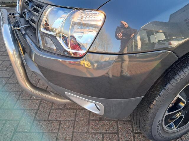 Dacia DUSTER 1.2 TCe 4x2 Blackshadow | Airco | Cruise control | Trekhaak | Leren bekleding | Stoelverwarming | Ndl auto | Navigatie | RIJKLAARPRIJS INCL 12 MAANDEN GARANTIE EN BEURT