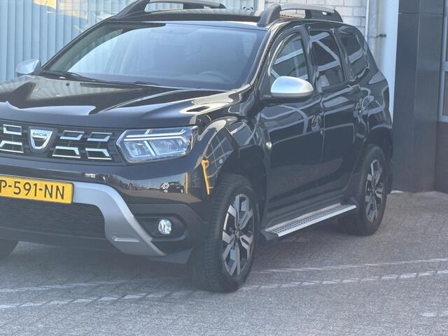 Dacia DUSTER 1.0 TCe Bi-Fuel Prestige | NAP | Trekhaak | Navigatie | Achteruitrijcamera | LED | Stoelverwarming | Climate Control | Key-less | Cruise Control | Lichtmetaal |