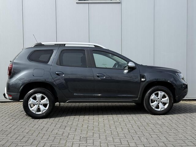 Dacia DUSTER 1.2 TCe Comfort / Trekhaak 1.500 KG / Airco / Cruise Control / Bluetooth / Elek. Ramen Voor + Achter / Lichtsensor /