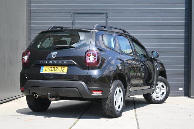 Dacia DUSTER TCe 130 Comfort | TREKHAAK | NAVI | CAMERA | AIRCO | CRUISE CONTROL | ALL-SEASONBANDEN | PDC