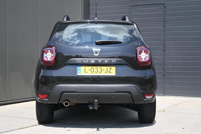 Dacia DUSTER TCe 130 Comfort | TREKHAAK | NAVI | CAMERA | AIRCO | CRUISE CONTROL | ALL-SEASONBANDEN | PDC