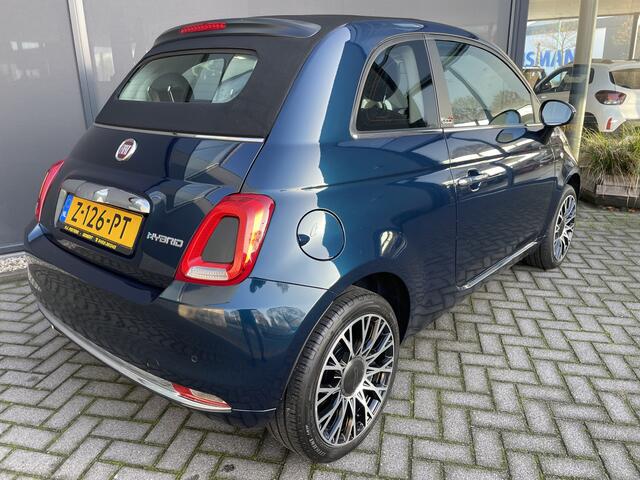 Fiat 500 1.0 Hybrid Airco - Cruise control - Parkeersensoren achter - Open dak - Bluetooth - Navigatiesysteem - Mistlampen voor - Stuur multifunctioneel - Elektrische ramen voor - Stuur leder - Licht metalen vel