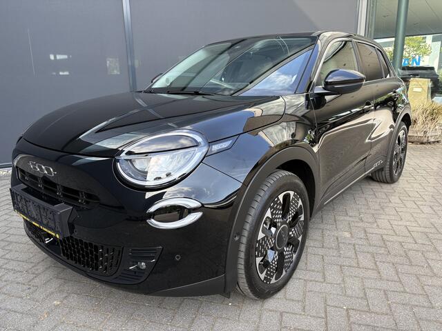Fiat 600 600e La prima 54 Kwh Achteruitrijcamera - Apple carplay - Navigatie - Cruise control - Stoelverwarming - Climate control - Parkeersensoren - Lederen bekleding - Bluetooth - Licht metalen velgen 18 inch - Mistlamp - Draadloze telefoonoplader - Stuurwiel mu