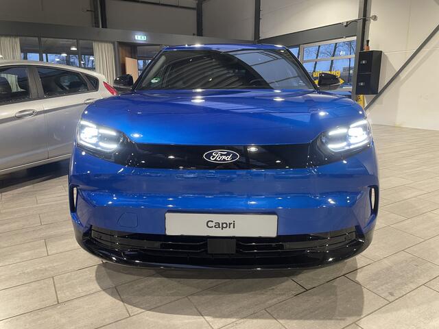 Ford CAPRI Extended Range RWD 77 kWh | Trekhaak | Warmtepomp | Adapt. Cruise | Winter Pack | El. verst. stoel + geh. + mass. | garantie tot 07/2029 | 4 seiz. banden