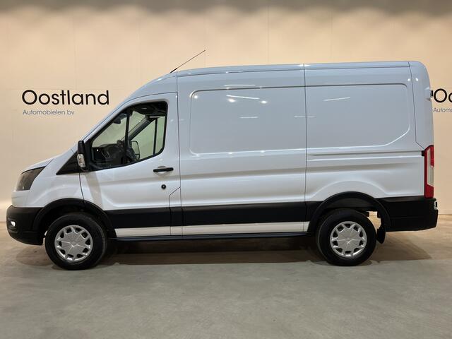 Ford E-Transit 350 L2H2 Trend 68 kWh / 100% Elektrisch !! / Airco / Cruise Control / CarPlay / Camera / Navigatie / 3-Zits / 10.000 KM !!