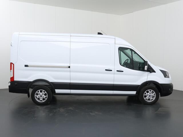 Ford E-Transit 350 | L3 H2 | TREND | 68 kWh | 317 KM WLTP | | NAVIGATIE | CLIMATE CONTROL | ADAPTIEVE CRUISE | 360 GRADEN CAMERA | STOELVERWARMING | APPLE CARPLAY / ANDROID AUTO | DODEHOEKDETECTIE