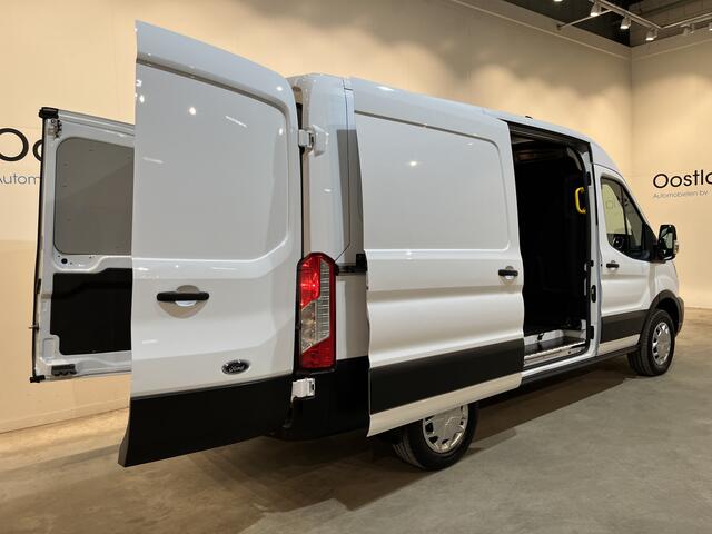 Ford E-Transit 390 (3500 kg) L2H2 Trend 68 kWh / 100% Elektrisch !! / Airco / Cruise Control / CarPlay / Camera / Navigatie / 3-Zits /