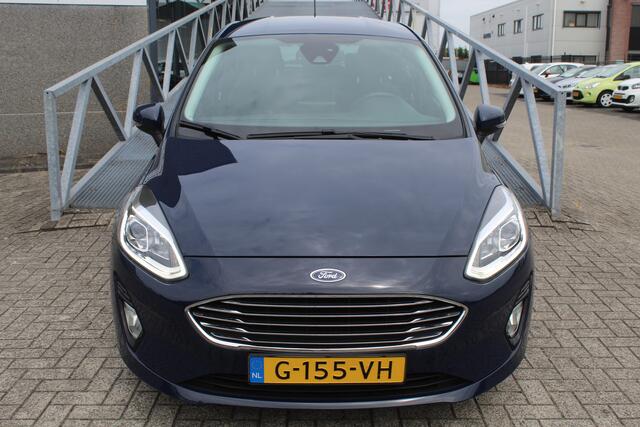 Ford FIESTA 1.0 EcoBoost Titanium Cruise control/Climate control/Lane assist/Apple carplay/Parkeersensoren/DAB+/Elektrisch inklapbare spiegels/16'' Lichtmetalen velgen.