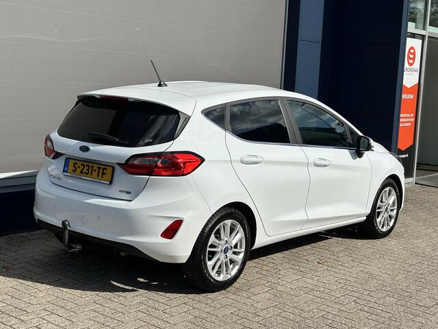 Ford FIESTA 1.0 EcoBoost Hybrid Titanium | Lage Km stand 25000 | Trekhaak | All Season banden | Climate control | Navigatie | Stoel / Suur en Voorruit verwarming | Cruise control | LED Apple Carplay/ Android Auto Parkeersensoren