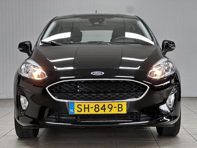 Ford FIESTA 1.1 Trend/ Apple + Android/ 16'' LMV/ Lane-Assist./ Navi/ Airco/ Cruise/ Elek. pakket/ Isofix/ Bluetooth/ Multi. LEDER. Stuur/ Mistl./ PDC/ Dagrijverl.