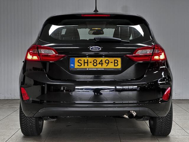 Ford FIESTA 1.1 Trend/ Apple + Android/ 16'' LMV/ Lane-Assist./ Navi/ Airco/ Cruise/ Elek. pakket/ Isofix/ Bluetooth/ Multi. LEDER. Stuur/ Mistl./ PDC/ Dagrijverl.