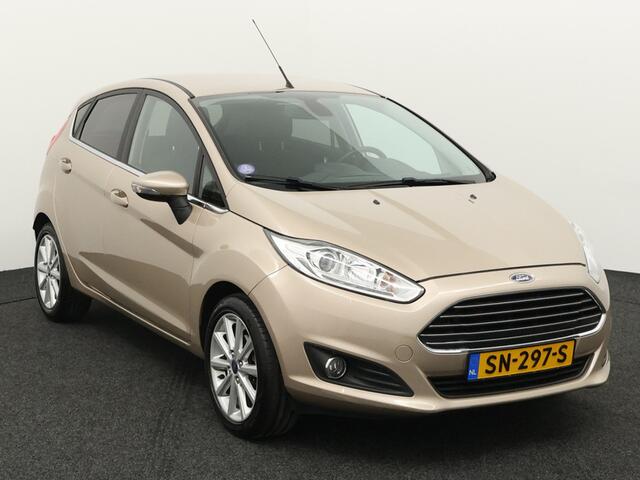 Ford FIESTA 1.0 EcoBoost Titanium Trekhaak, Bluetooth, Cruise control, Parkeersensor achter, Regensensor, Verwarmd voorruit, Lichtmetalen velgen 16, Ontdek deze sportieve en betrouwbare Ford Fiesta 1.0 EcoBoost Titanium uit 2017 met handgeschakelde transmissie. Dankz