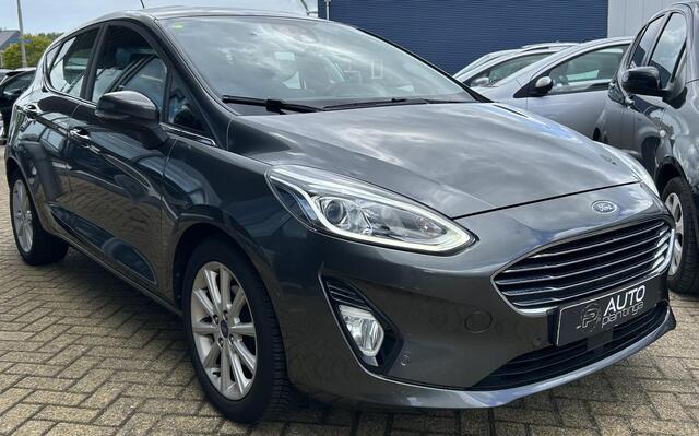 Ford FIESTA 1.0 EcoBoost Titanium 101PK | 1e Eigenaar! | Dealeronderhouden | NL AUTO | AUTOMAAT | Trekhaak | Achteruitrijcamera | B&O Audio | Navigatie | Climate Control | Adaptive Cruise Control | Voorruitverwarming | Parkeersensoren Voor en Achter |