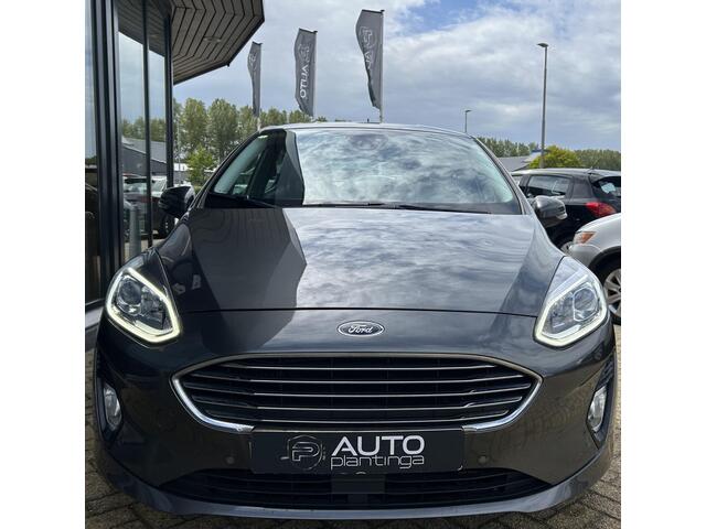 Ford FIESTA 1.0 EcoBoost Titanium 101PK | 1e Eigenaar! | Dealeronderhouden | NL AUTO | AUTOMAAT | Trekhaak | Achteruitrijcamera | B&O Audio | Navigatie | Climate Control | Adaptive Cruise Control | Voorruitverwarming | Parkeersensoren Voor en Achter |