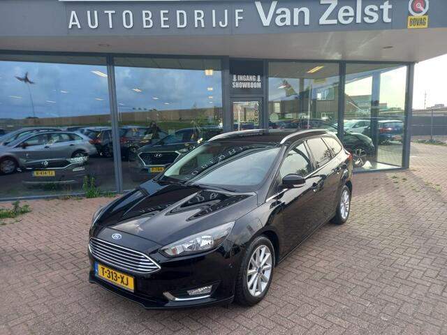 Ford FOCUS Wagon 1.5 Titanium 150 PK, Airco(automatisch), Multimedia systeem, App connect, Cruise control, Navigatie, Parkeerhulp, Parkeersensoren, Stuurverwarming, Stoelverwarming , Voorruit verwarmd, Zeer nette auto inclusief Bovag garantie