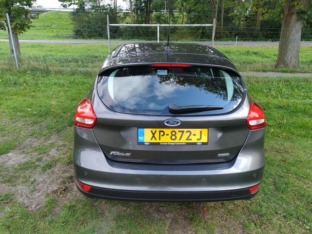 Ford FOCUS 1.0 Titanium | CLIMA | NAVI | CRUISE CONTROL | PARKEERSENSOREN ACHTER |