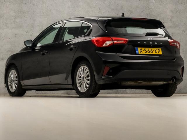Ford FOCUS 1.0 EcoBoost Titanium Sport Automaat (APPLE CARPLAY, GROOT NAVI, CLIMATE, CAMERA, KEYLESS, SPORTSTOELEN, CRUISE, LM VELGEN, PARKEERSENSOREN, NIEUWSTAAT)