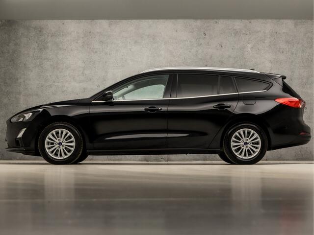 Ford FOCUS Wagon 1.0 EcoBoost Titanium X Automaat (VIRTUAL COCKPIT, APPLE CARPLAY, GROOT NAVI, STUUR/STOELVERWARMING, SPORTSTOELEN, ADAPTIVE CRUISE, KEYLESS, GETINT GLAS, CAMERA, NIEUWSTAAT)